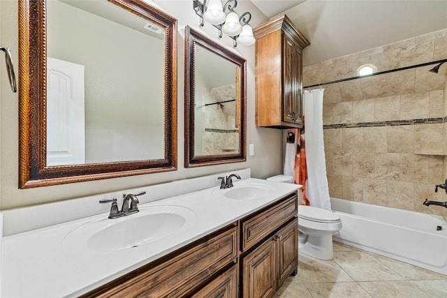 full bathroom featuring tile patterned floors, vanity, shower / bath combo, and toilet