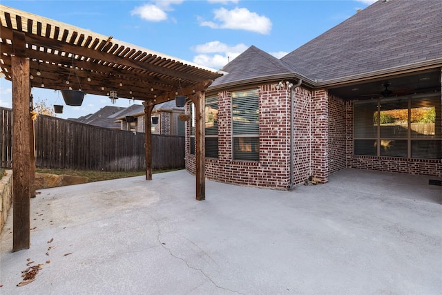 view of patio featuring a pergola