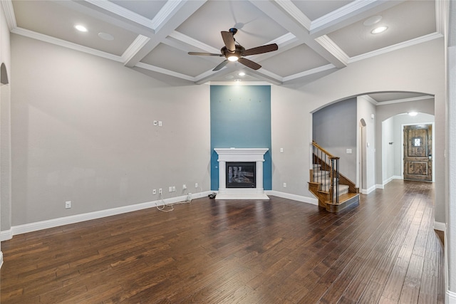 unfurnished living room with beam ceiling, ceiling fan, and coffered ceiling