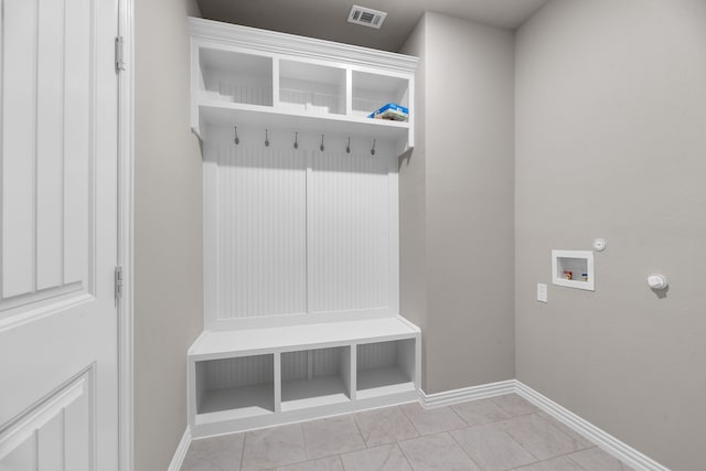 mudroom featuring baseboards and visible vents