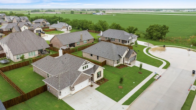 aerial view with a rural view and a residential view