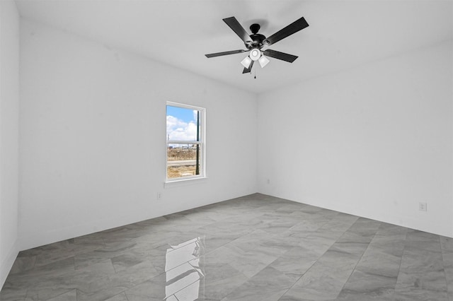 unfurnished room featuring ceiling fan