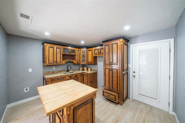 kitchen featuring sink and light hardwood / wood-style floors