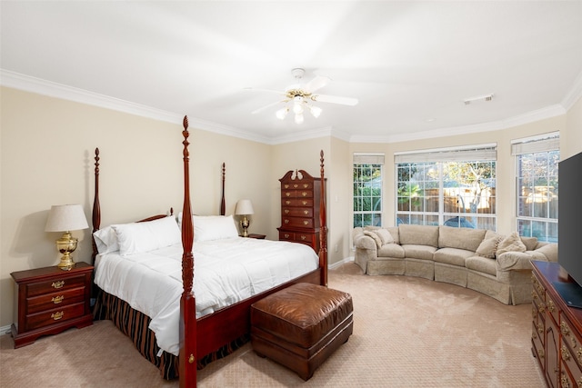 bedroom featuring light carpet, ceiling fan, and ornamental molding