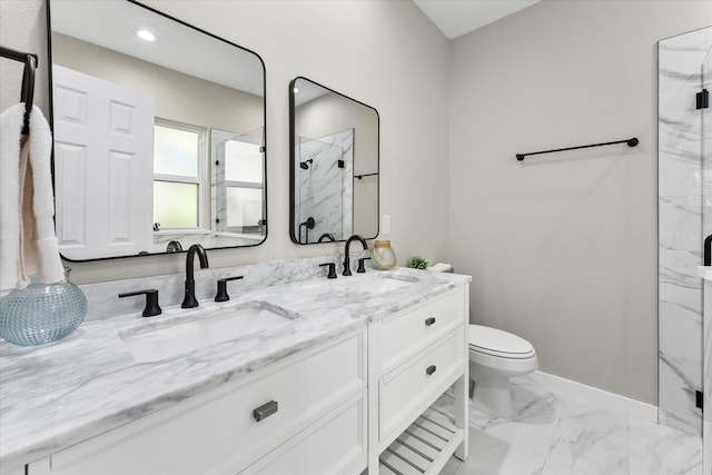 bathroom with vanity, toilet, and walk in shower