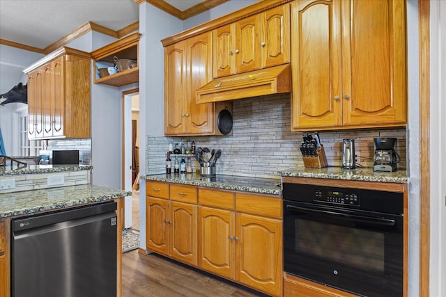 kitchen featuring tasteful backsplash, light stone countertops, black appliances, dark hardwood / wood-style flooring, and custom exhaust hood