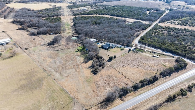 birds eye view of property featuring a rural view