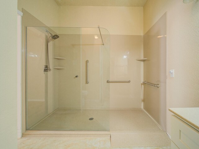 bathroom featuring walk in shower