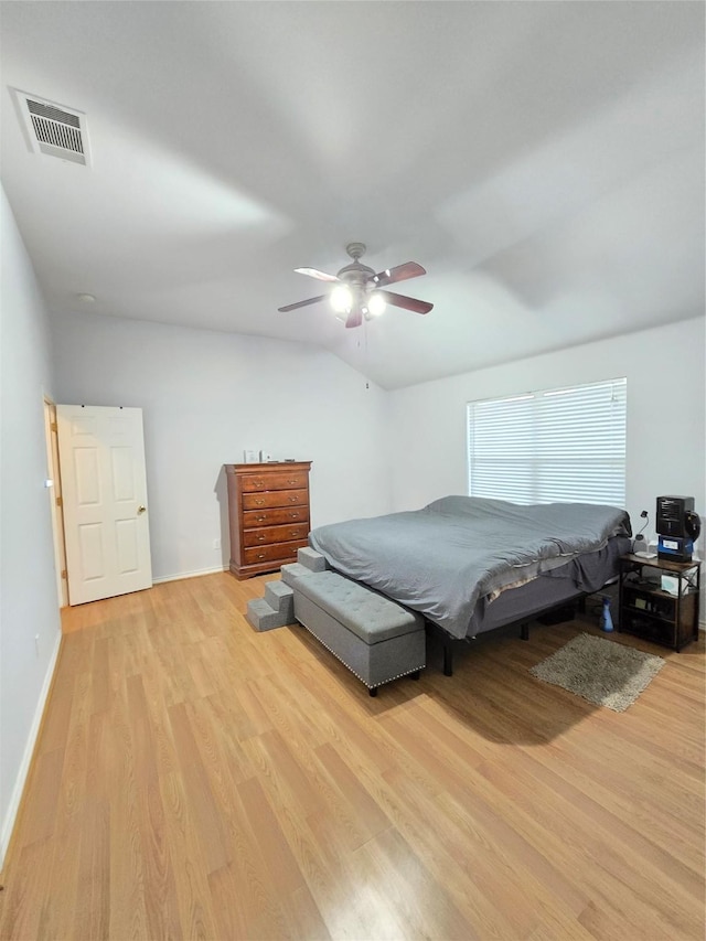 bedroom with light hardwood / wood-style flooring and ceiling fan