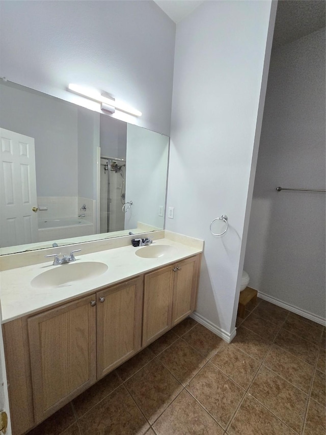 full bathroom featuring vanity, tile patterned flooring, plus walk in shower, and toilet