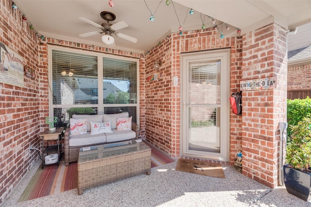 view of exterior entry with an outdoor hangout area and ceiling fan