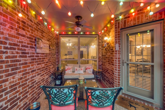 view of patio featuring ceiling fan