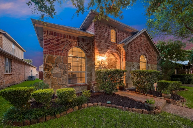 view of front of property with central AC unit