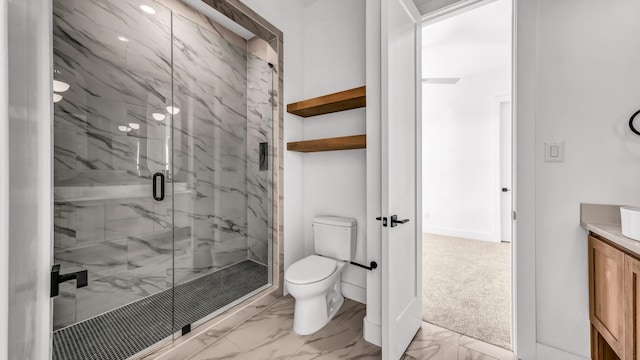 bathroom with toilet, marble finish floor, a marble finish shower, and vanity