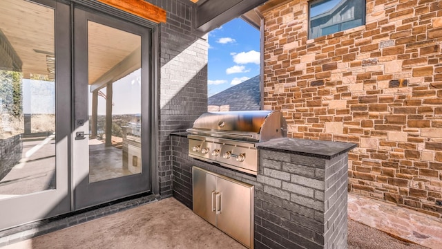 view of patio / terrace featuring exterior kitchen and area for grilling