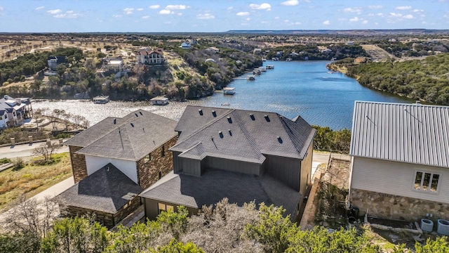 drone / aerial view with a water view