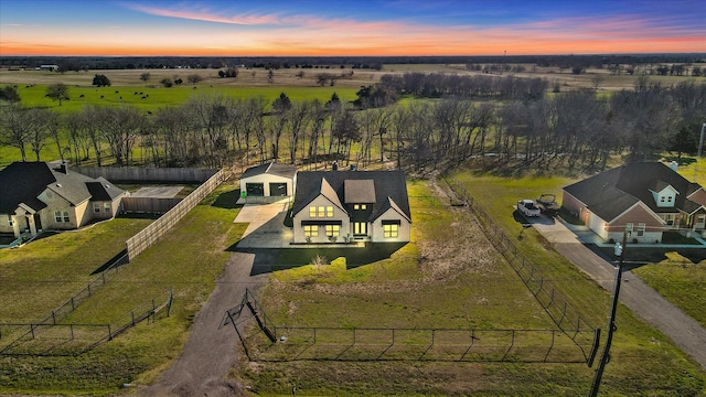 aerial view at dusk with a rural view