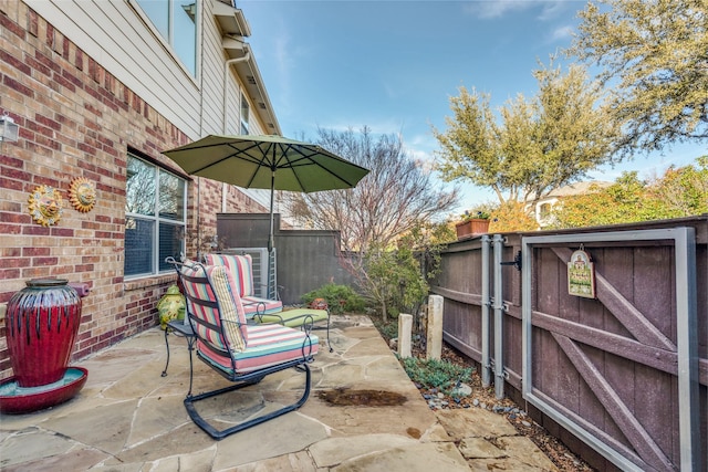 view of patio / terrace with fence