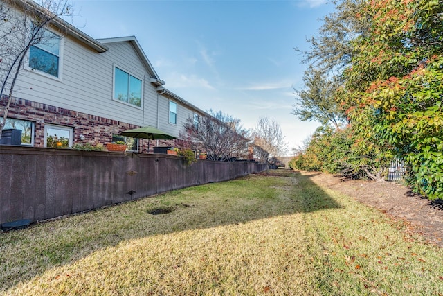 view of yard with fence