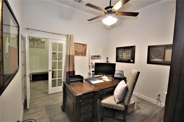 home office with french doors, ceiling fan, ornamental molding, and wood-type flooring