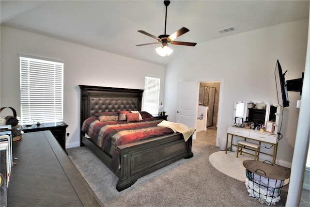 bedroom with multiple windows, carpet, vaulted ceiling, and ceiling fan