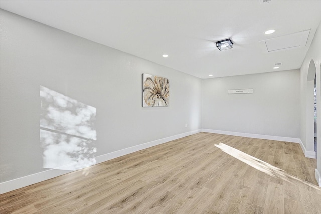 spare room featuring light hardwood / wood-style flooring