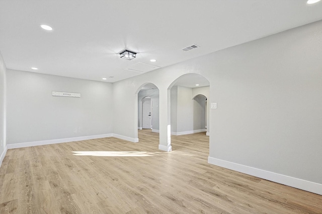 empty room with light hardwood / wood-style floors