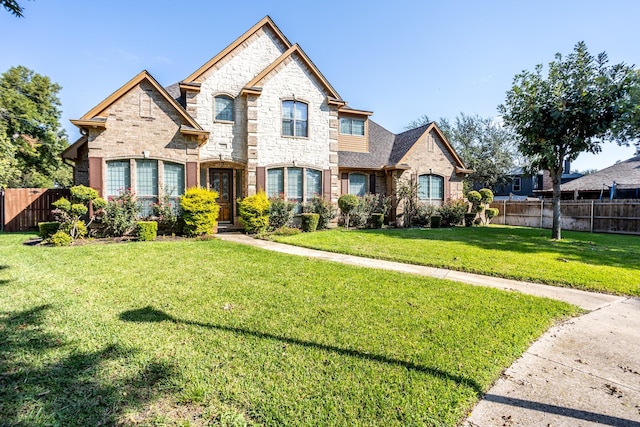 view of front of house featuring a front lawn