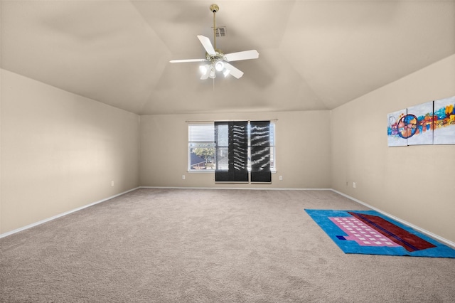 interior space featuring vaulted ceiling and ceiling fan