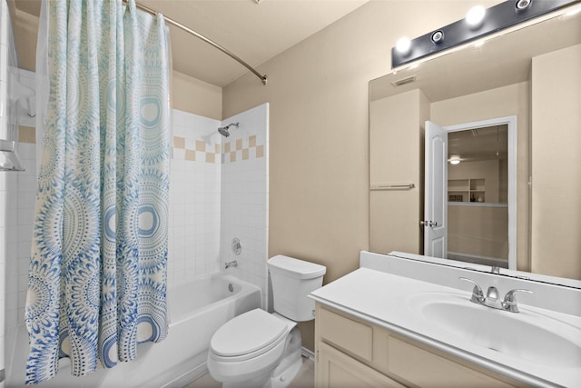 full bathroom with shower / bath combination with curtain, toilet, and vanity