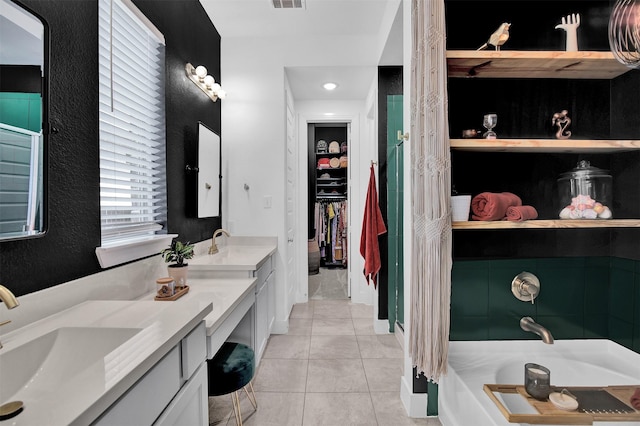 bathroom featuring tile patterned floors and vanity