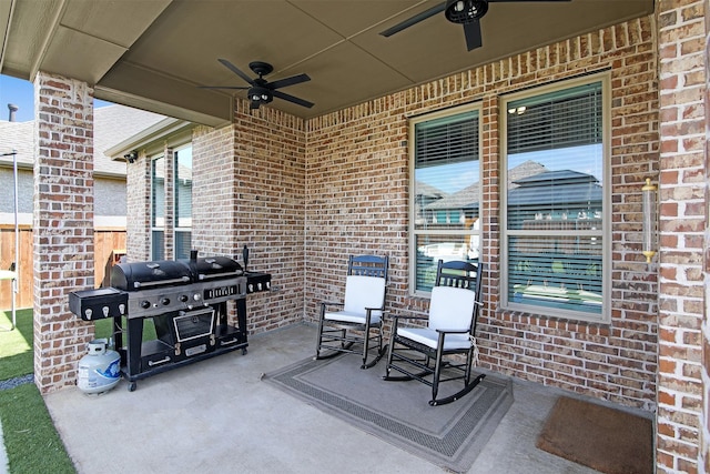 view of patio / terrace with grilling area and ceiling fan