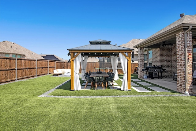 view of yard featuring a gazebo and a patio