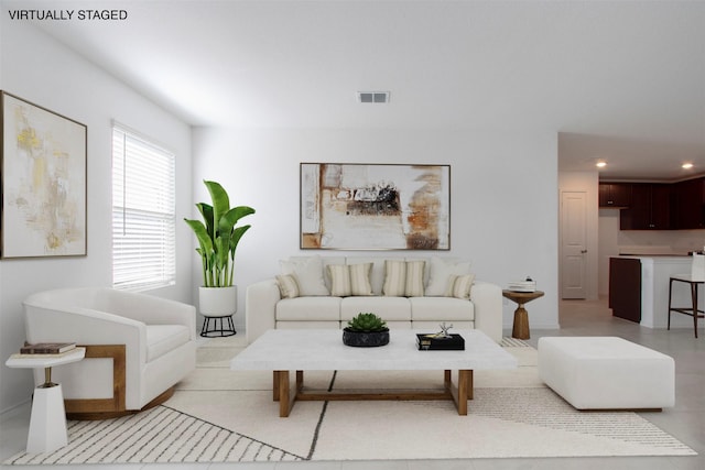 living room with plenty of natural light