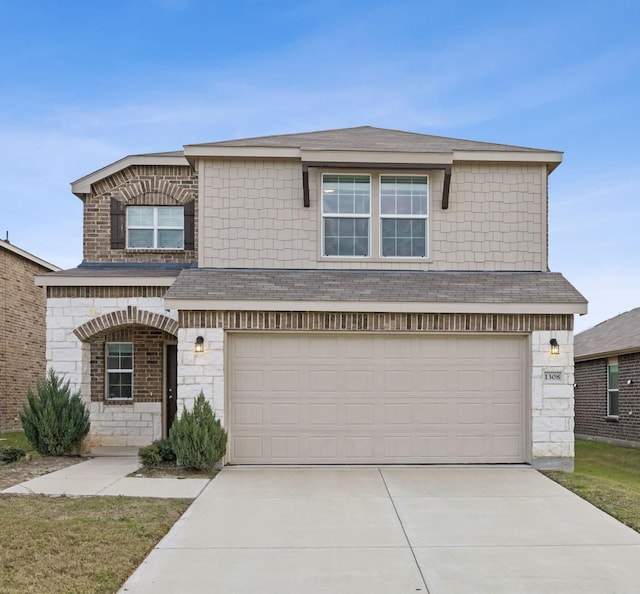 view of front of house with a garage