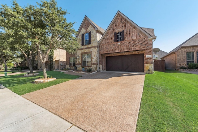 view of front facade with a garage and a front yard