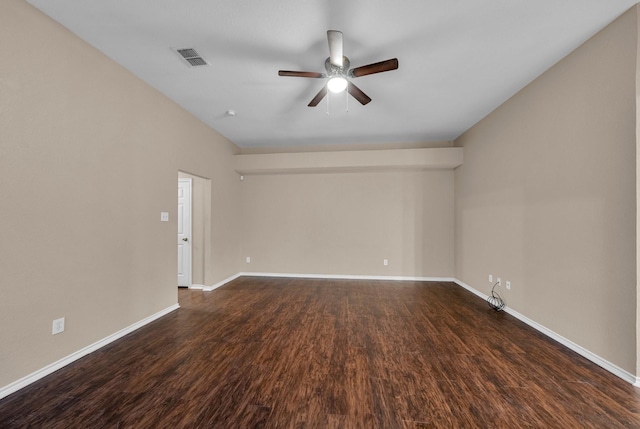 unfurnished room featuring ceiling fan and dark hardwood / wood-style flooring