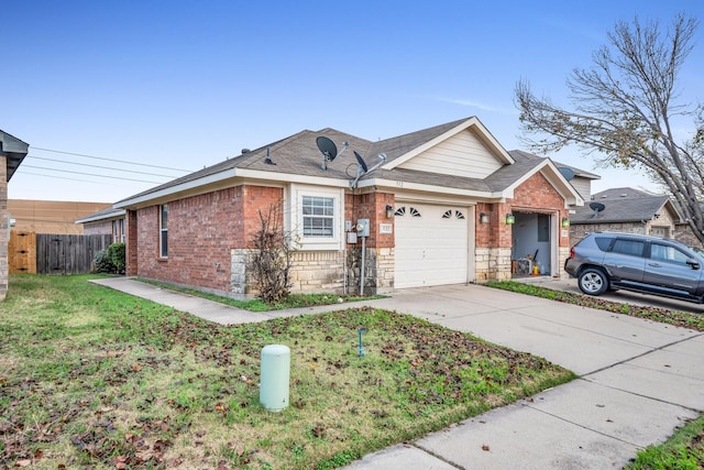 ranch-style house with a garage and a front yard