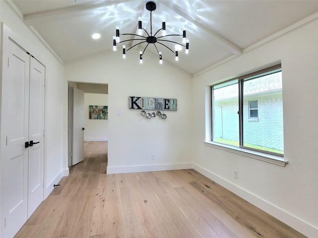 unfurnished room with lofted ceiling with beams, light wood-type flooring, ornamental molding, and an inviting chandelier