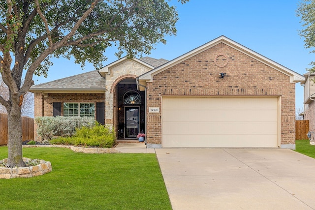 ranch-style home with a garage and a front lawn