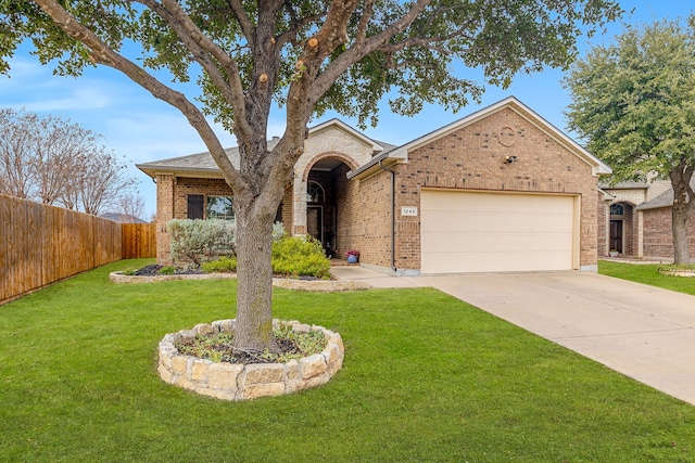 single story home featuring a front yard and a garage