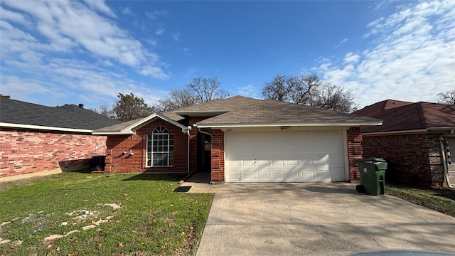 single story home with a garage and a front lawn