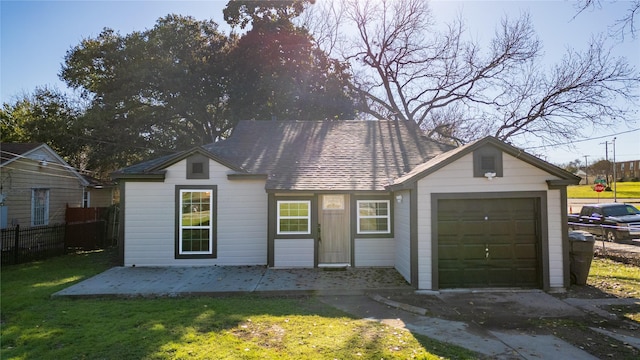 1600 Hemphill Dr, Dallas, TX 75216 - view of front of house featuring an attached garage, driveway, and a shingled roof