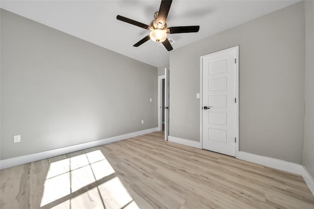 unfurnished bedroom with light hardwood / wood-style floors and ceiling fan