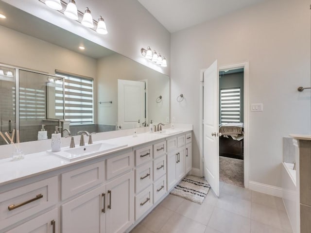 bathroom with vanity, separate shower and tub, and tile patterned flooring