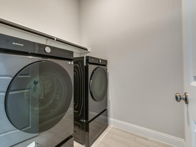 laundry room with washer and dryer