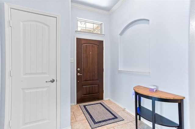 tiled entryway with crown molding