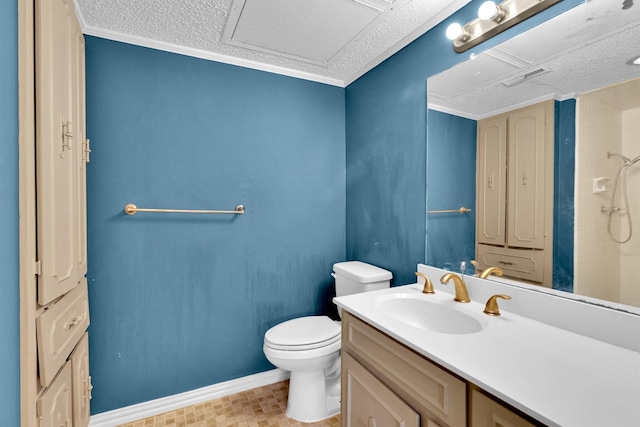 bathroom featuring vanity, a textured ceiling, a shower, and toilet