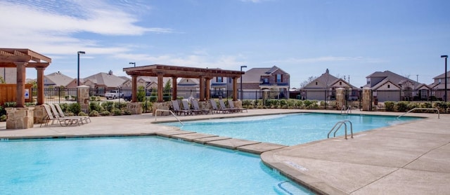 view of swimming pool featuring a patio