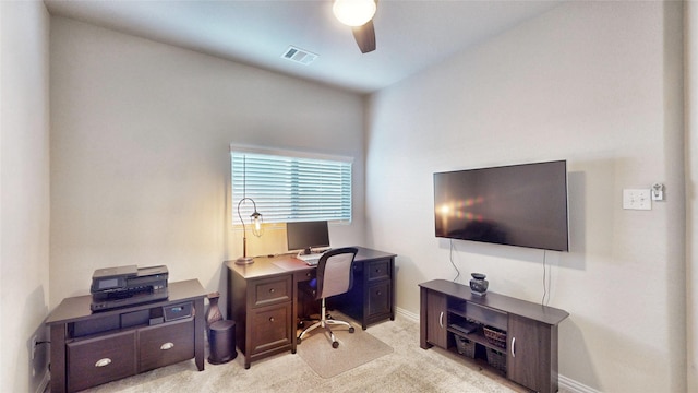 office with ceiling fan and light colored carpet